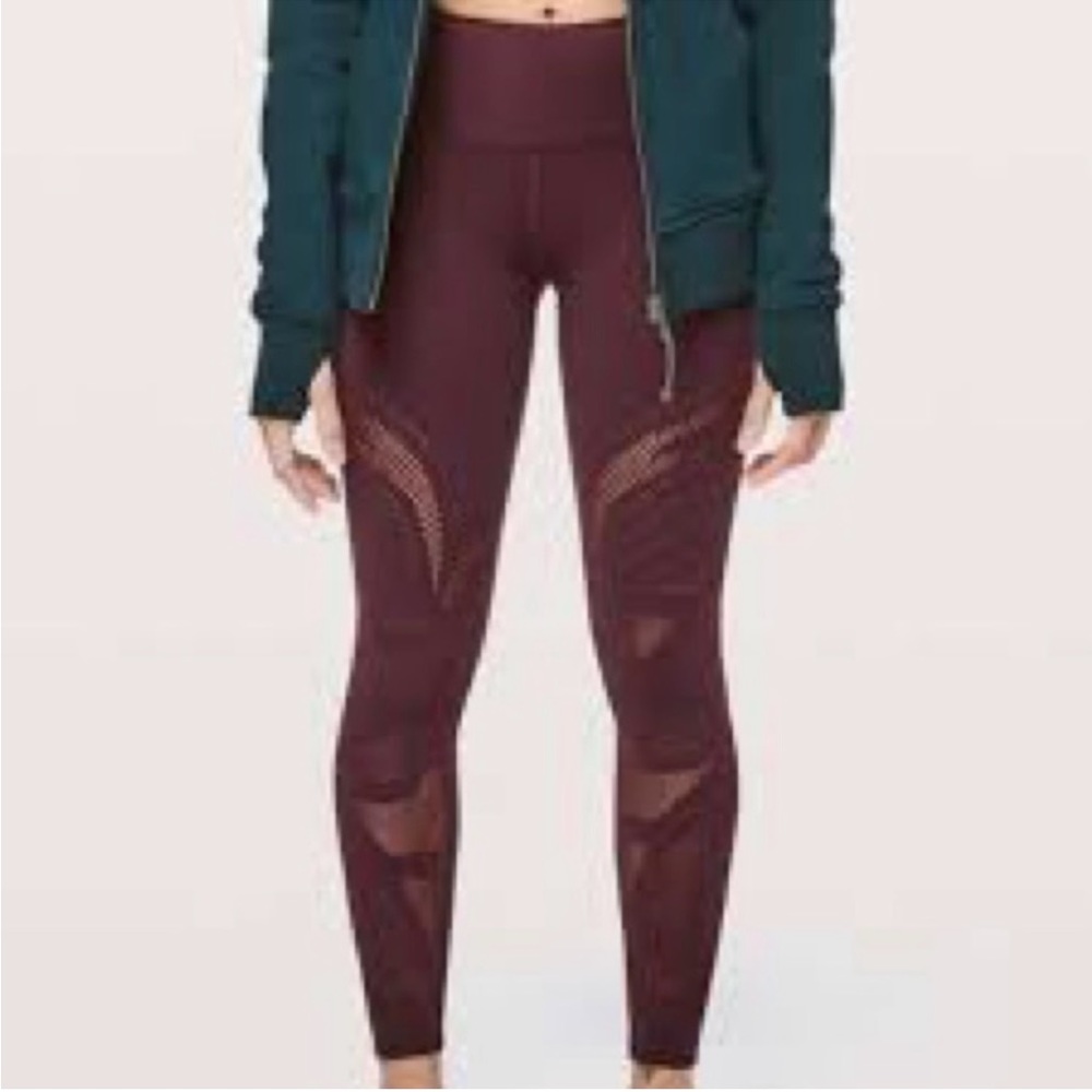 Lululemon dark eggplant leggings with cutout floral design - size 8
